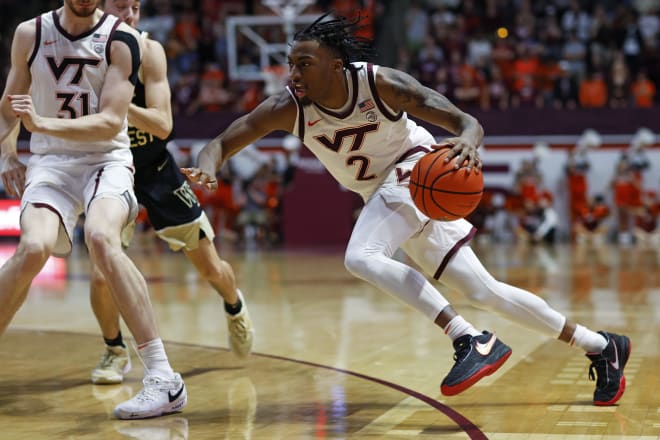 Collins drives to the basket against Wake Forest.