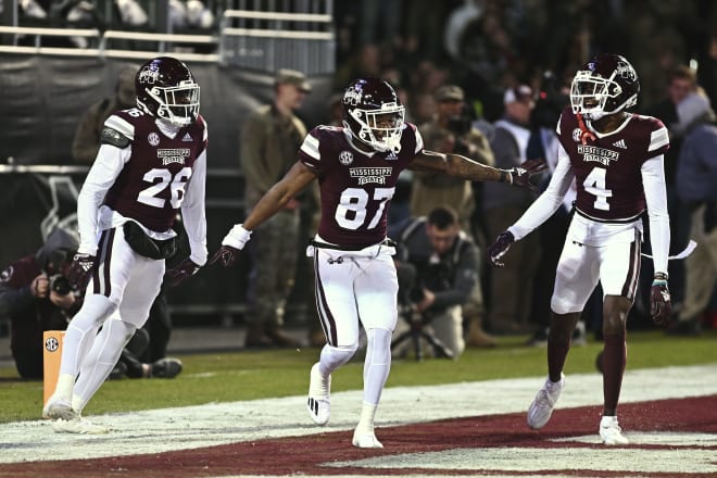 Nov 12, 2022; Starkville, Mississippi, USA; Mississippi State Bulldogs wide receiver Zavion Thomas (87) celebrates with teammates after a touchdown on a punt return against the Georgia Bulldogs during the second quarter at Davis Wade Stadium at Scott Field.