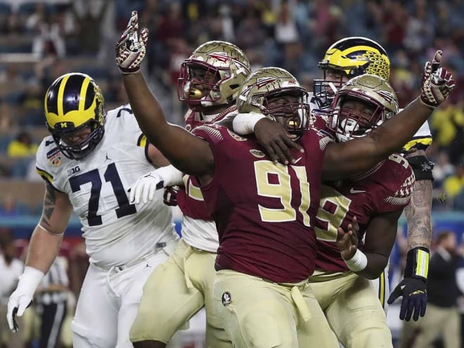 Junior defensive tackle Derrick Nnadi says he's still 'committed' to Florida State.