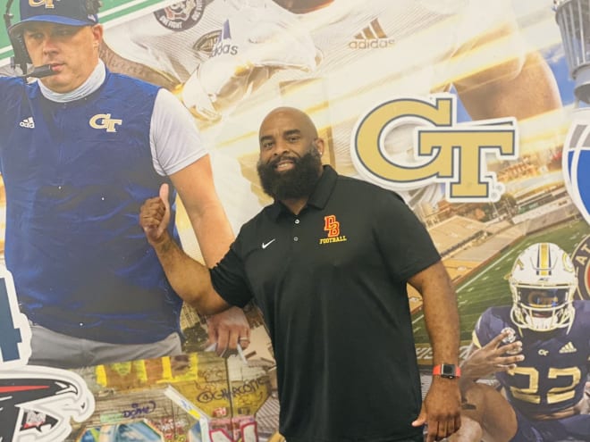 Watson poses in his old HS gear at Georgia Tech last year