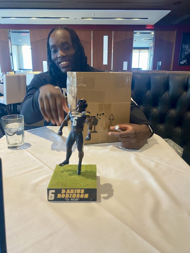 Darius Robinson shows off the surprise his brother gifted him a day before the 2024 NFL Draft.