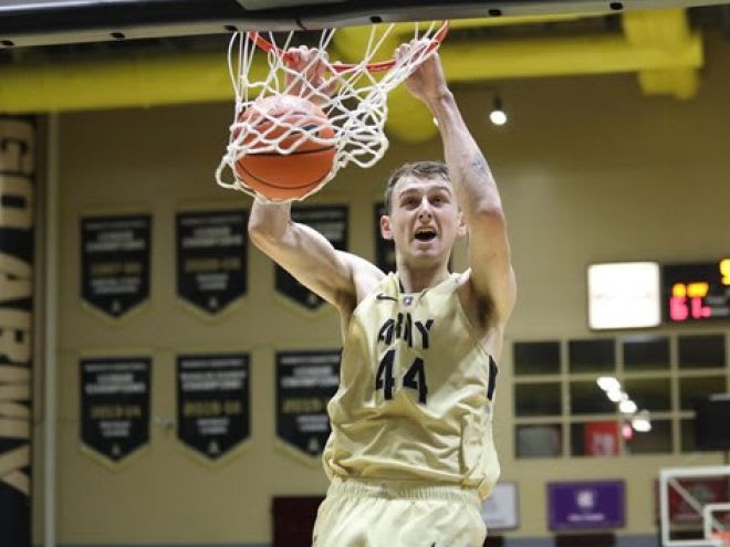 Sophomore forward Matt Dove throws it down for two