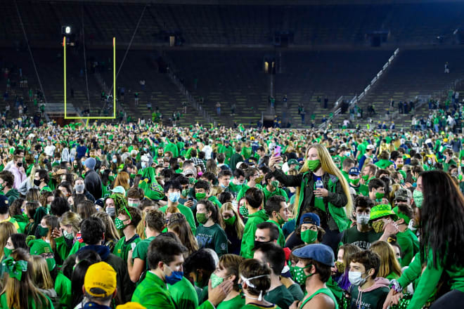Fans storm the field after the Notre Dame Fighting Irish defeated the Clemson Tigers 47-40 in two overtimes. Photo | Imagn 