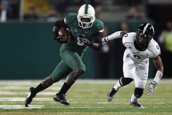 Veal gets by a defender during a game against Cincinnati.