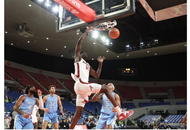 Alabama Center Charles Bediako (14) dunks the ball against North Carolina at the Phil Knight Invitational in Portland, OR on Sunday, Nov 27, 2022. Photo by Robert Sutton