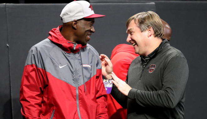 Kirby Smart and Jimmy Smith yuk it up at last year's state playoffs at Mercedes Benz Stadium.