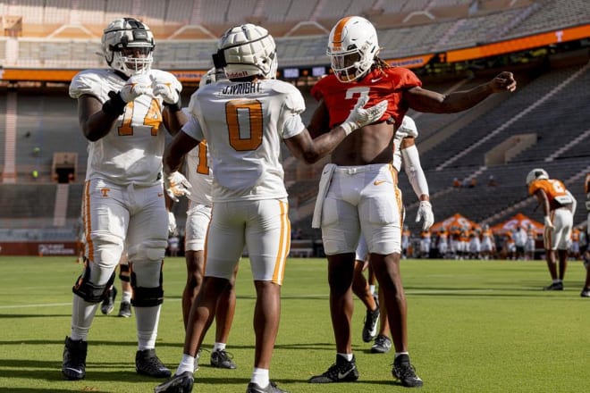 Tennessee running back Jaylen Wright (0) celebrates with quarterback Joe Milton III (7) and offensive lineman John Campbell Jr. (74) during a scrimmage at Neyland Stadium on Aug. 16, 2023.