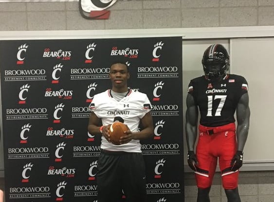 Hicks poses during a JR Day visit to UC in Feb. 