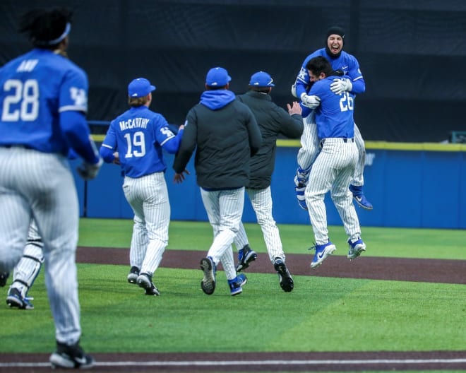 The Cats celebrate their 13-12 win over Western Michigan.