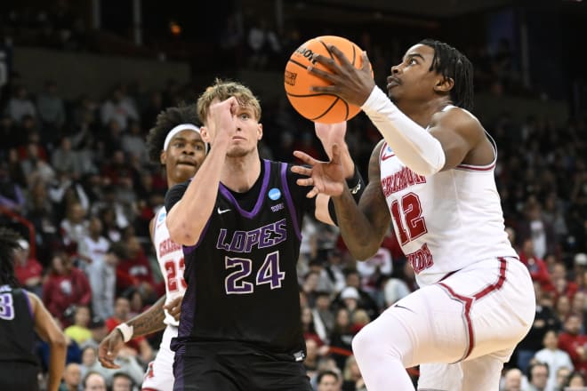 Alabama Crimson Tide guard Latrell Wrightsell Jr. (12) plays the ball pressured by Grand Canyon Antelopes forward Duke Brennan (24) in the first half at Spokane Veterans Memorial Arena. Photo | James Snook-USA TODAY Sports