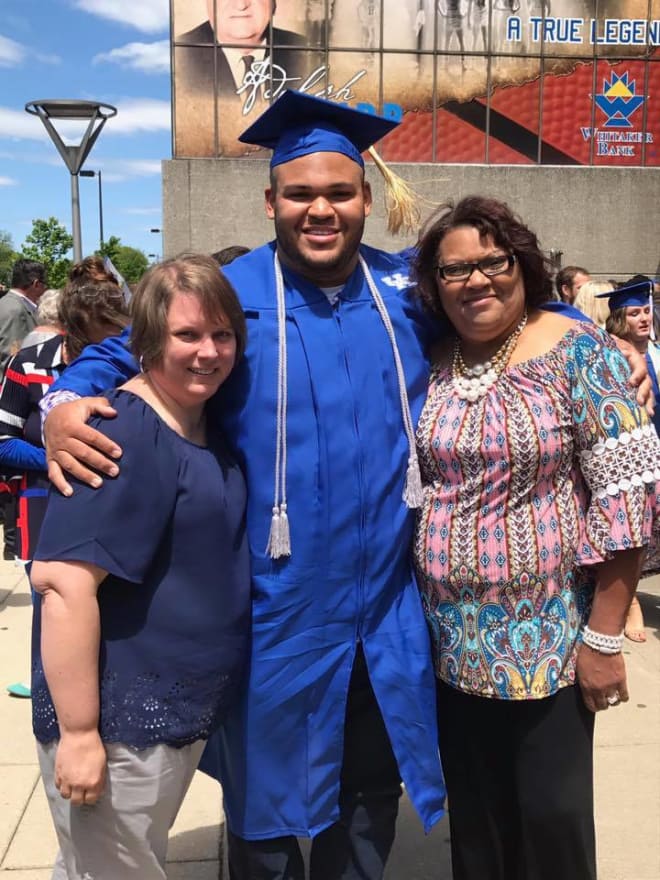 Ann Deaton, left, and Patricia Hyde, right, with Jacob Hyde after UK's graduation. 