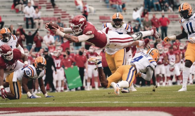 Arkansas quarterback Feleipe Franks dives for a score versus LSU.