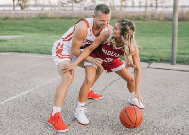 Brad Davison is Wisconsin' leader in games played and 3-point shots. Tyra Buss leads Indiana in six categories, including scoring. They will marry this July.