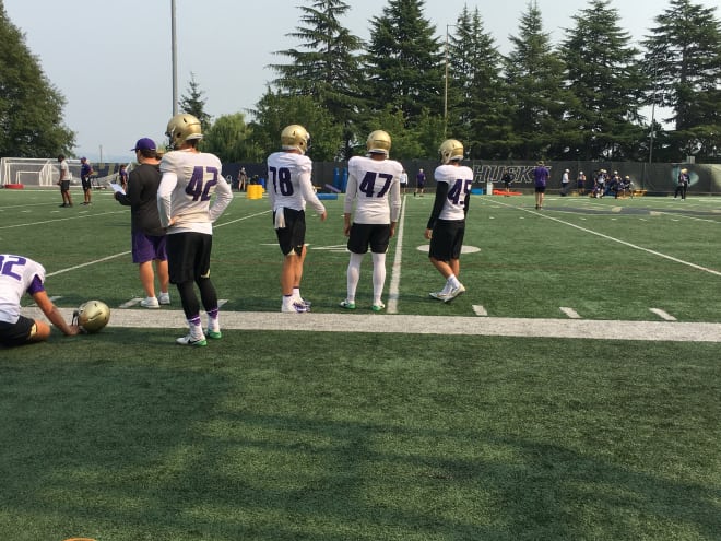 UW specialists Van Soderberg (No. 42), Matteo Mele (No. 78), Peyton Henry (No. 47) and Dylan Williams (No. 45) at practice on Monday.
