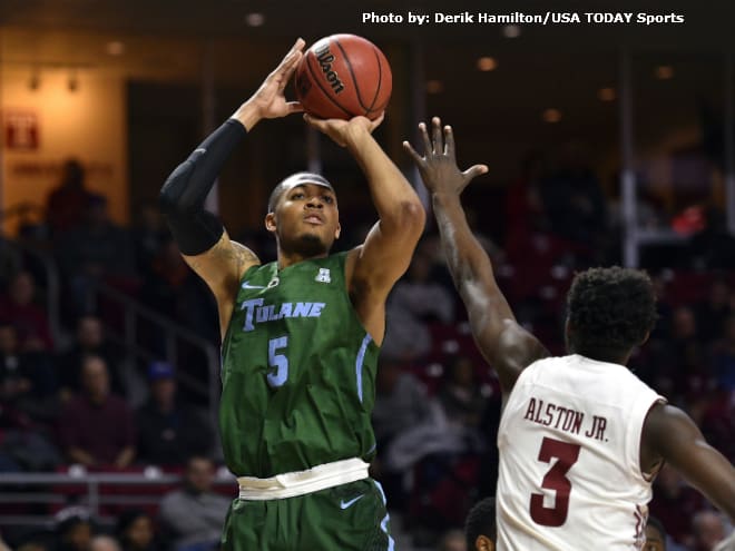 Tulane Green Wave guard Cameron Reynolds (5) shoots the ball against Temple