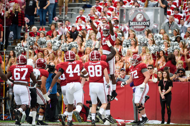 Alabama Crimson Tide wide receiver Cam Sims (17) celebrates with teammates after catching a touchdown against the Mercer Bears during the third quarter at Bryant-Denny Stadium. Photo | USA Today