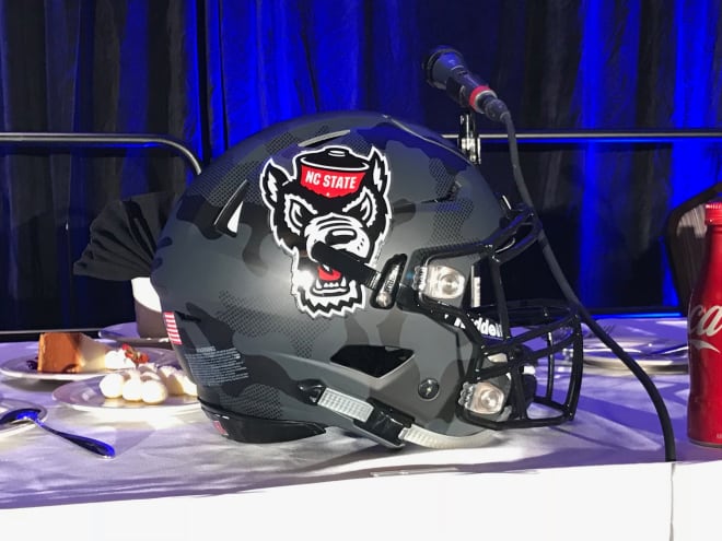 This NC State helmet brought in $1,100 at auction, the highest of all the helmets on the table (includes Duke, East Carolina, North Carolina and North Carolina Central).