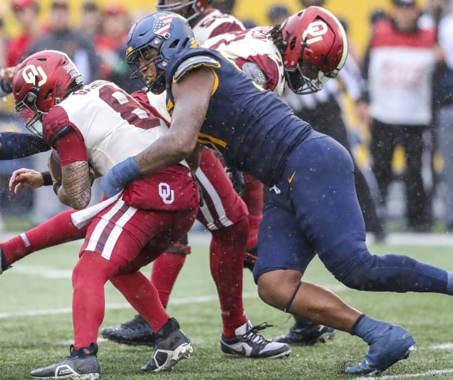 What returns for the West Virginia Mountaineers on the defensive side of the ball?