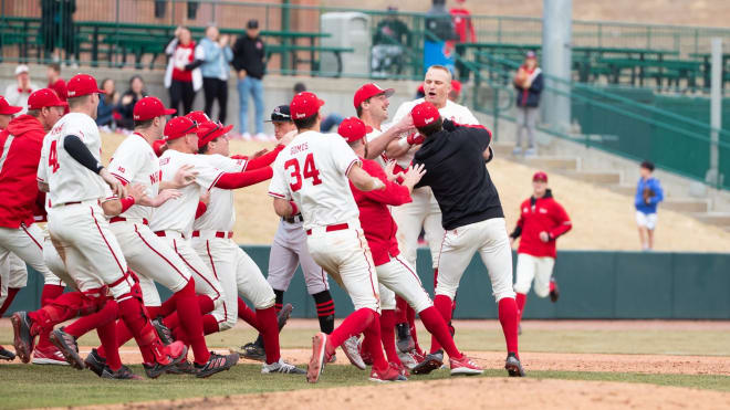 The Nebraska Baseball team huddles after walking off yet another game.