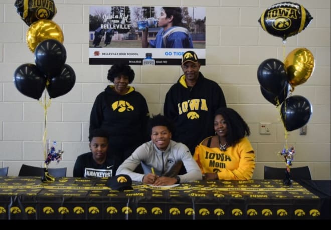 Kaevon Merriweather and family on signing day in February.