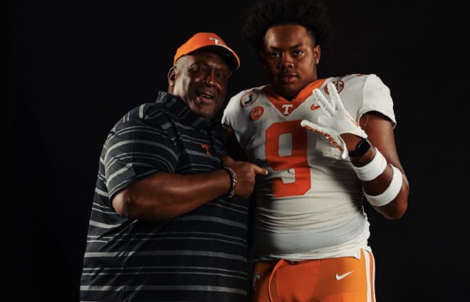 Ethan Utley with Tennessee football defensive line coach Rodney Garner.