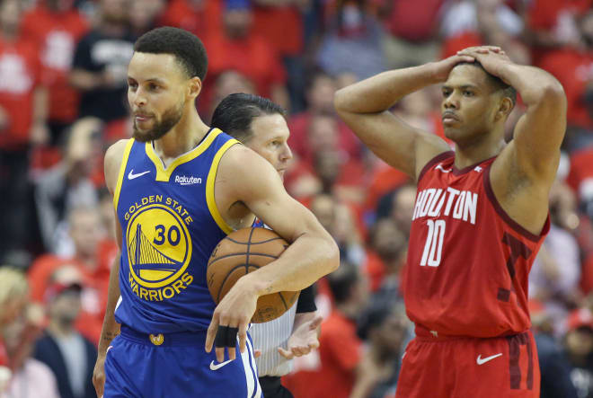 Former IU standout Eric Gordon (right, No. 10) and the fourth-seeded Houston Rockets fell to the top-seeded Golden State Warriors 4-2 in their best-of-seven NBA Western Conference semifinals series
