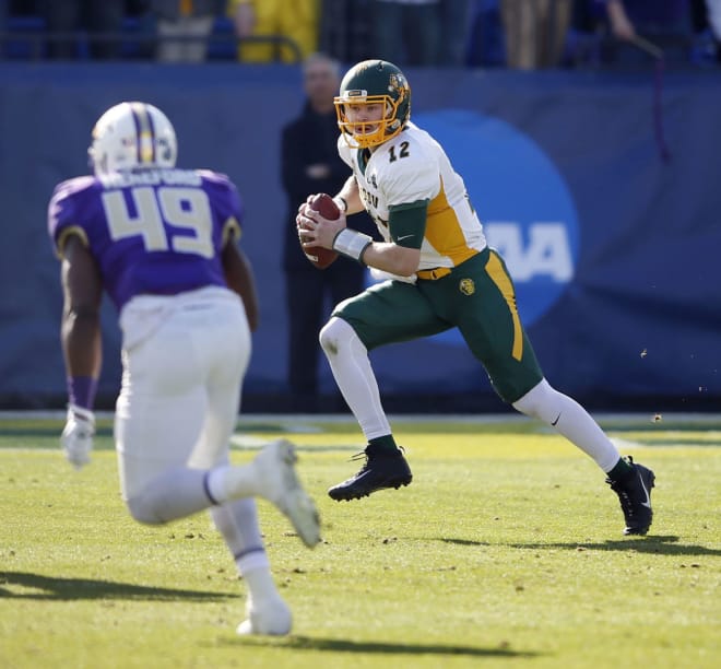 North Dakota State quarterback Easton Stick scrambles runs with the ball during the Bison's 17-13 win over James Madison at the FCS championship game in Frisco, Texas.