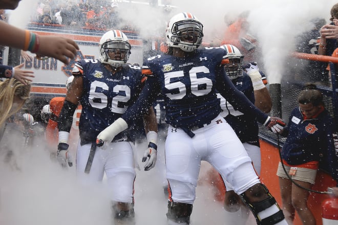 Avery Young (56) was a versatile and productive offensive lineman at Auburn.