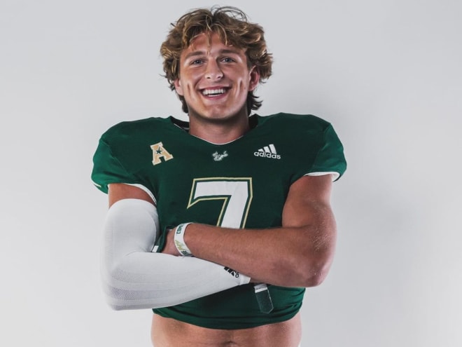 Kubay poses during his official visit to USF