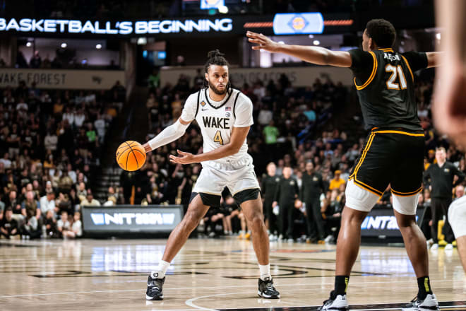 Efton Reid III makes a pass against App State. 