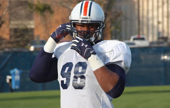 Wanogho is working at defensive end during the spring.