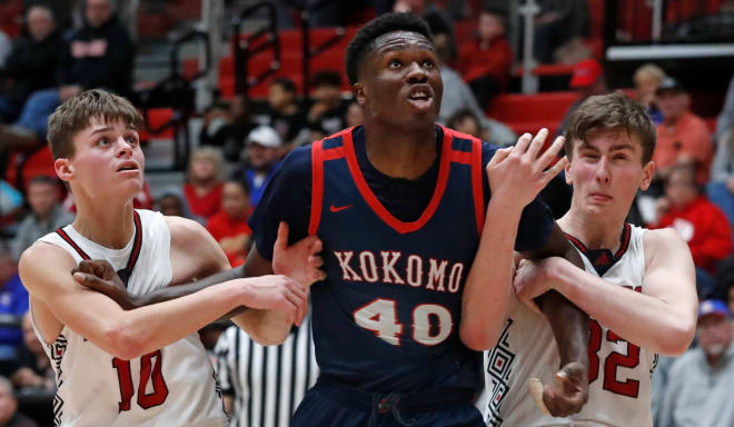 Lafayette Jeff Bronchos guard Ethan Smith (10) and Lafayette Jeff Bronchos Parker Rosi (32) attempt to box out Kokomo Wildkats center Flory Bidunga (40) during the IHSAA boy s basketball game, Friday, Jan. 27, 2023, at Lafayette Jeff High School in Lafayette, Ind. Kokomo won 49-43.