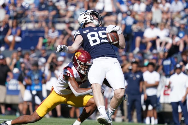 Isaiah Pola-Mao makes a tackle after a long reception by BYU tight end Matt Bushman on Saturday.