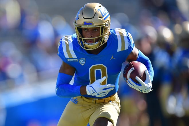 Oct 7, 2023; Pasadena, California, USA; UCLA Bruins wide receiver Kam Brown (0) runs the ball against the Washington State Cougars during the second half at Rose Bowl. Mandatory Credit: Gary A. Vasquez-USA TODAY Sports