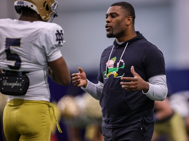 Notre Dame cornerbacks coach Mike Mickens, right, will be recruiting alongside head coach Marcus Freeman on Tuesday.