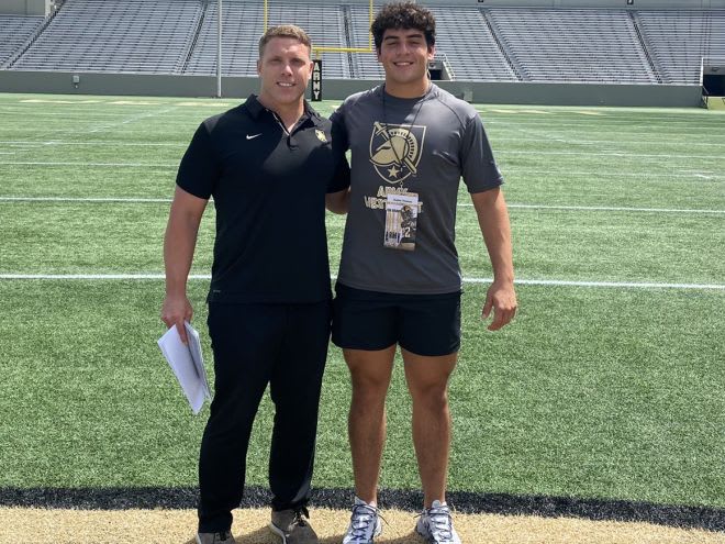 LB commit Andon Thomas during his June unofficial visit to West Point is with FB Coach Mike Viti