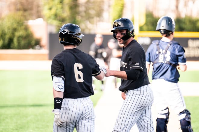 Justin Johnson, left, and Pierce Bennett celebrate this weekend. 