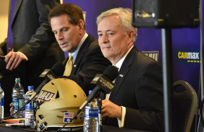 James Madison athletic director Jeff Bourne, right, introduces Curt Cignetti as football coach during a press conference this past December.