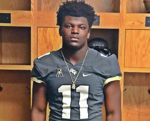 Jean poses in UCF kit during his visit to Orlando
