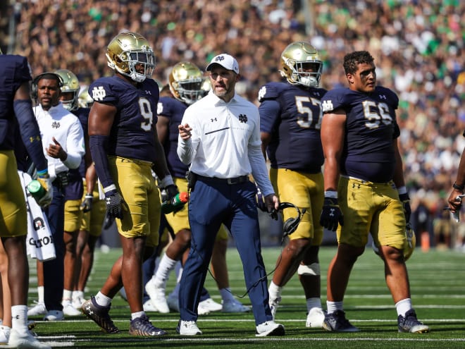 Special teams coordinator Brian Mason, center in white, was Notre Dame's most impactful assistant coach in 2022.