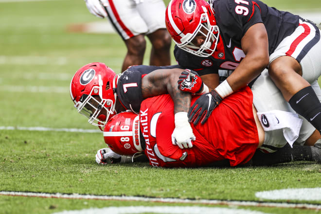 Quay Walker (7) led the Black team with eight tackles.