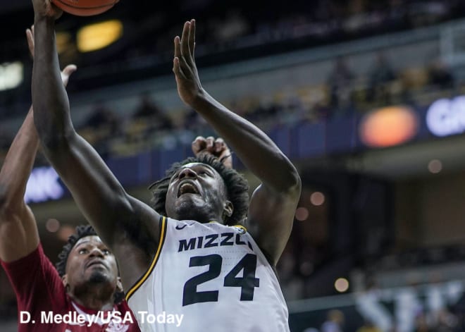 Kobe Brown scored a career-high 30 points and grabbed 13 rebounds as Missouri upset No. 15 Alabama.
