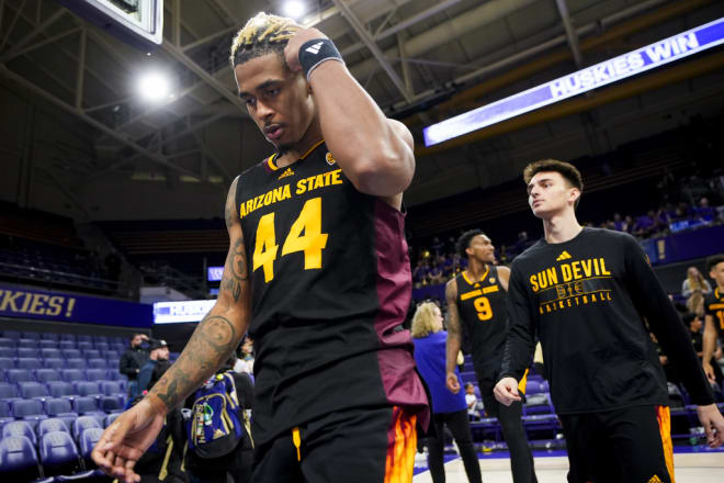 ASU guard Adam Miller (44) walks off the court with his teammates after their loss to Washington (AP Photo/Lindsey Wasson)