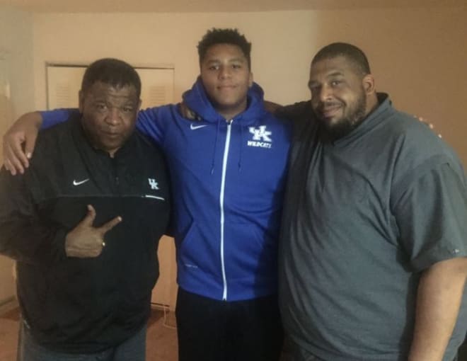 Vince Marrow, Naasir Watkins and the prospect's father, left to right (from Twitter)