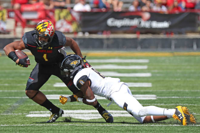 Maryland wide receiver D.J. Moore (No. 1) broke numerous tackles against Towson. 