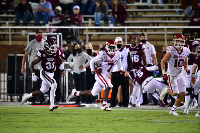 Razorback safety Joe Foucha running back an interception against Mississippi State.