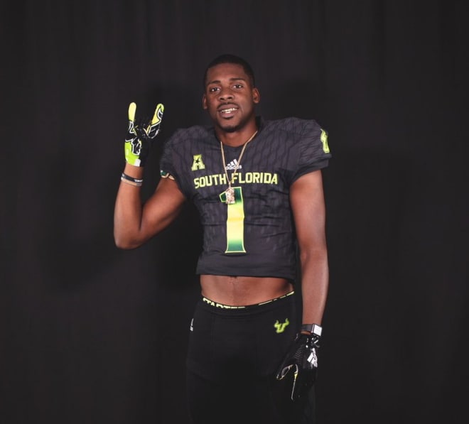 Turner poses during his USF visit