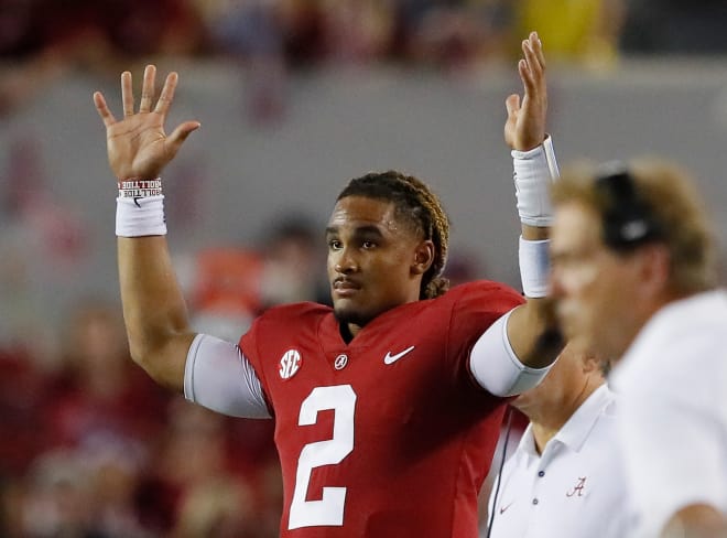 Alabama quarterback Jalen Hurts watches a play from the sidelines during Saturday's 41-23 win against Colorado State. Photo | Getty Images