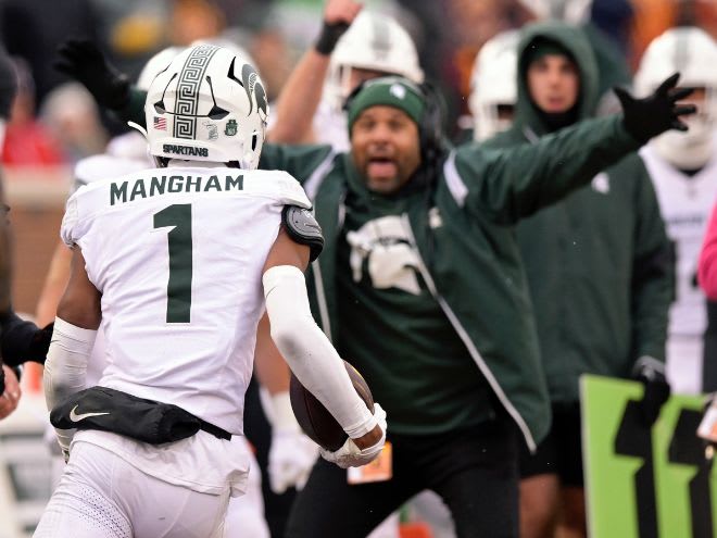 Michigan State safety Jaden Mangham celebrates after intercepting a pass against Minnesota on Oct. 28, 2023.