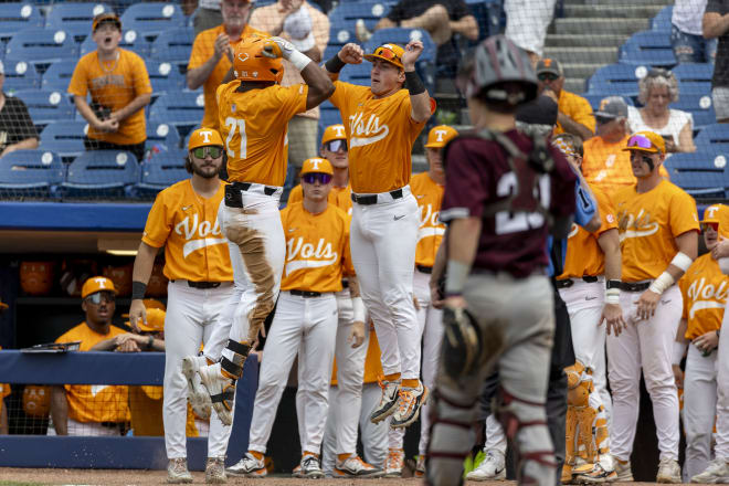 May 23, 2024; Hoover, AL, USA; Tennessee Volunteers outfielder Kavares Tears (21) celebrates his three-run home run with teammates during a game against the Texas A&M Aggies at the SEC Baseball Tournament at Hoover Metropolitan Stadium.